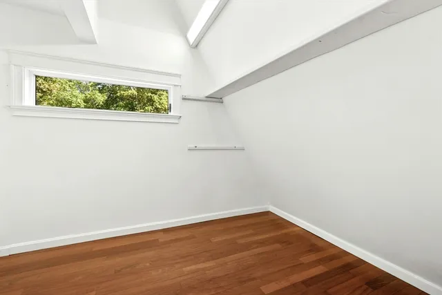 a bathroom that has a glass shower door