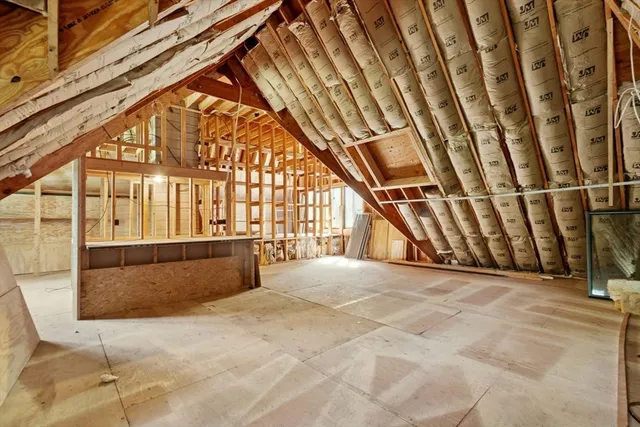 a view of a field with an tree