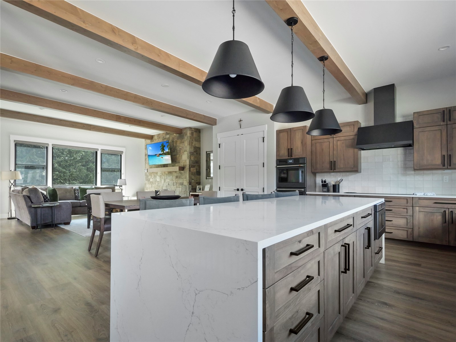 75 Alcove Court, Unit 75 Keystone, CO 80435 - Photo 7 of 40 a kitchen with stainless steel appliances a stove a sink a dining table and chairs