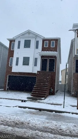 a view of a house with a door and a window