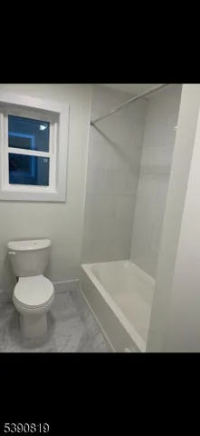 a bathroom with a toilet