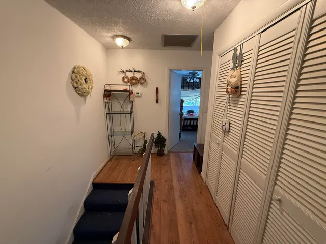 a view of a hallway with workspace