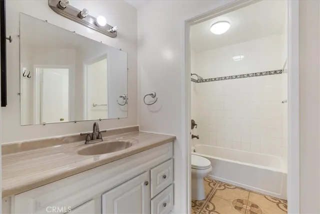 a view of a living room and a tree