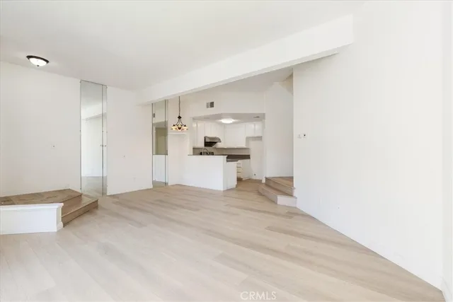 a view of a kitchen with a sink