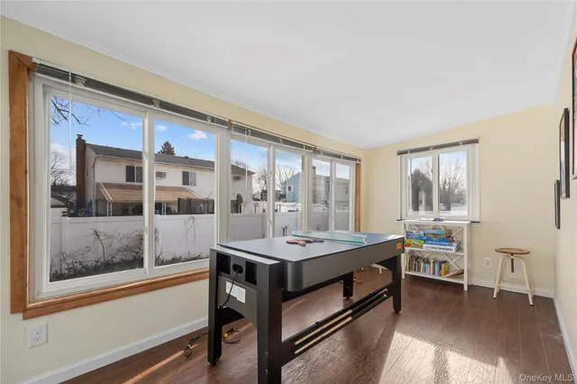 a room with a bed and a window