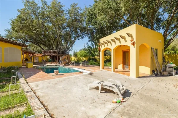 a view of a building with a park