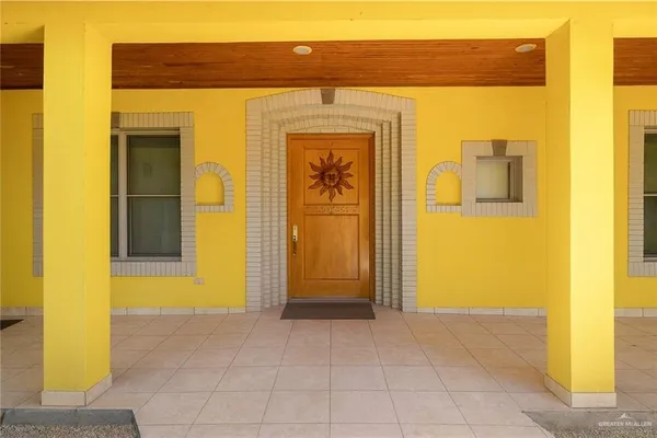 a view of a brick house with a door