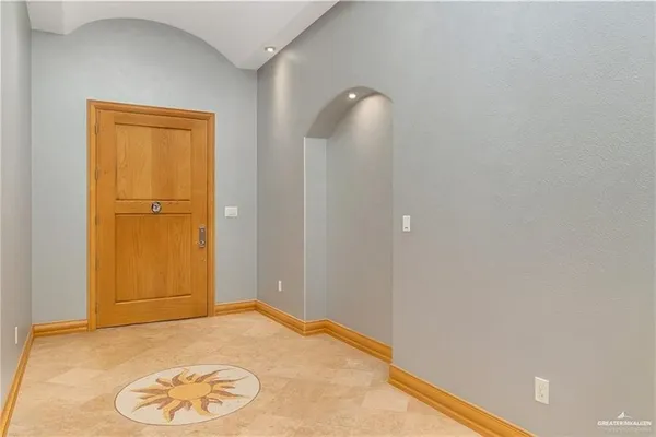 an empty room with a door