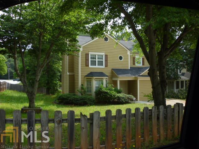 1136 Winston Drive Decatur, GA 30032 - Photo 1 of 1 a front view of a house with a yard