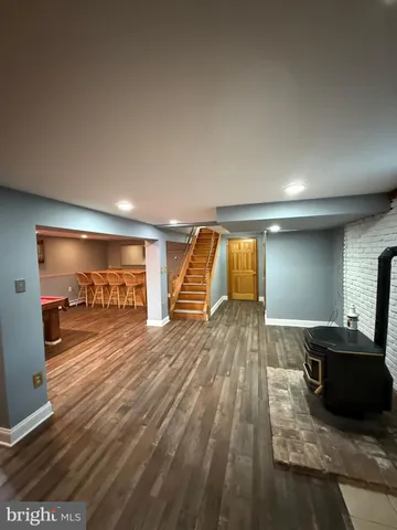 a view of a living room and bathroom