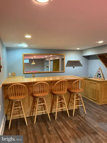 a dinning area with pool table and chair