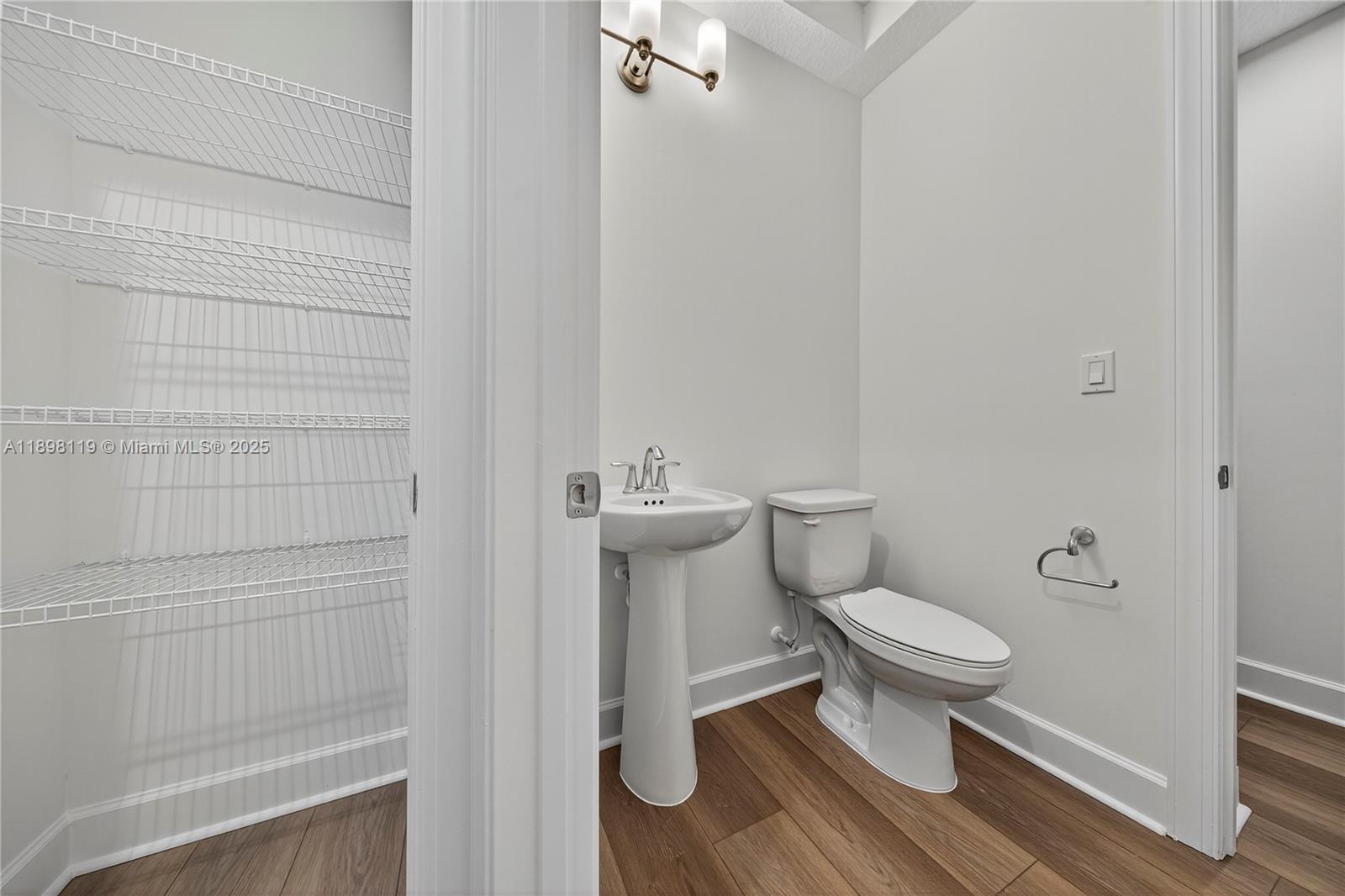 2722 Northwest 87th Terrace Cooper City, FL 33024 - Photo 34 of 44 a white toilet sitting next to a shower