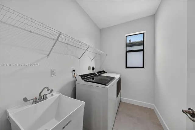 a kitchen with sink cabinets and window