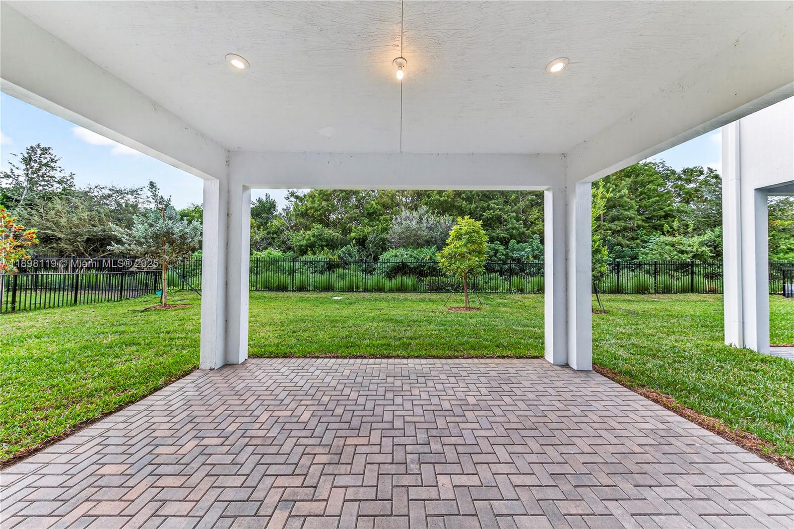 2722 Northwest 87th Terrace Cooper City, FL 33024 - Photo 41 of 44 a view of a yard with plants and garden