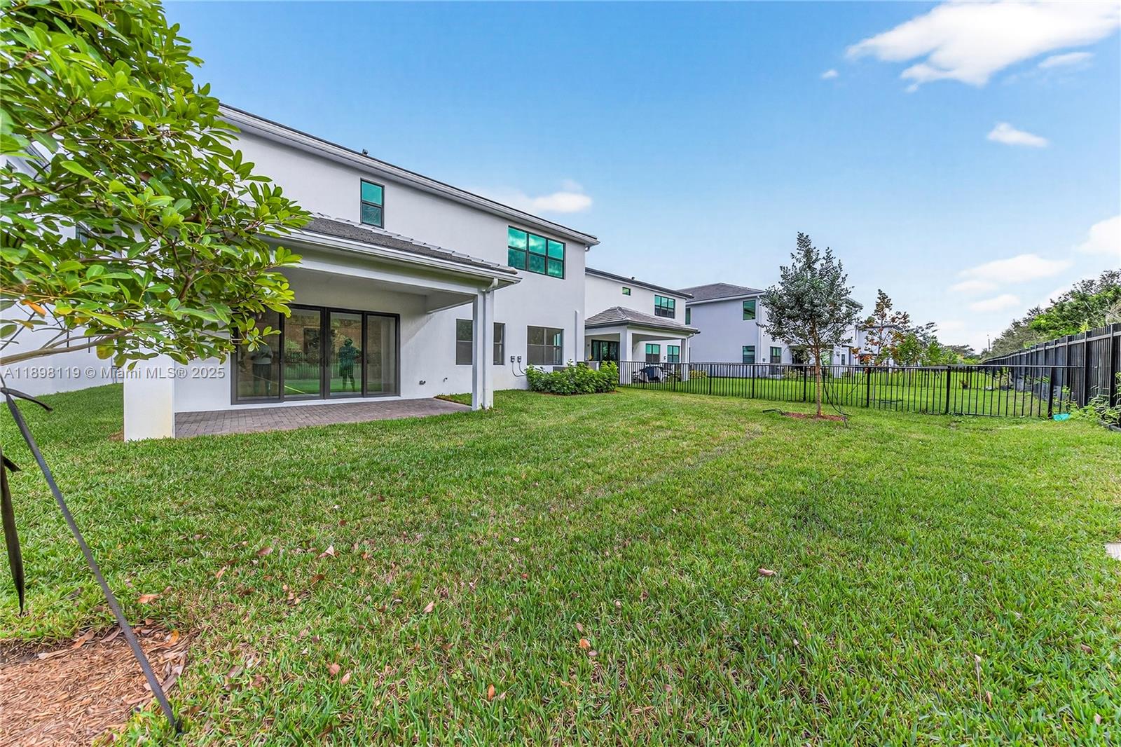 2722 Northwest 87th Terrace Cooper City, FL 33024 - Photo 42 of 44 a front view of a house with garden