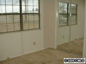 7132 Lingerfelt Road Vale, NC 28168 - Photo 5 of 8 a view of an empty room with a window