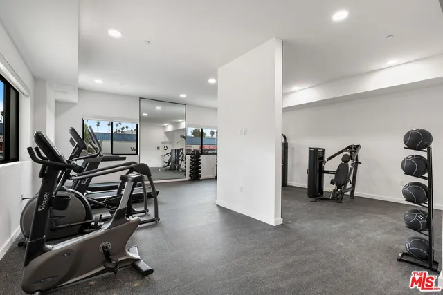 a view of a room with gym equipment