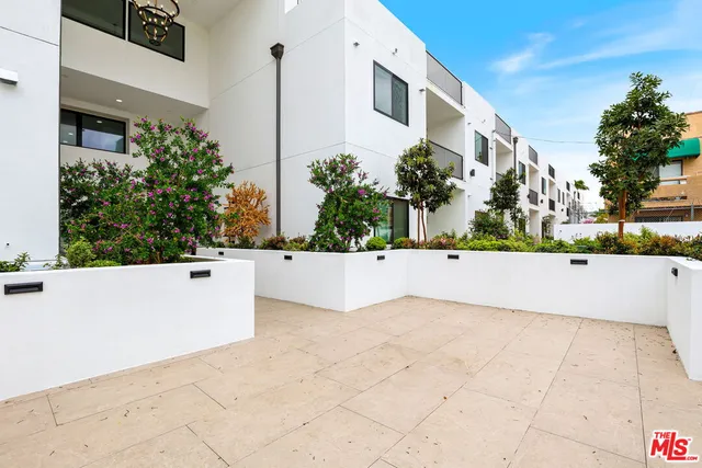 a view of swimming pool with outdoor seating