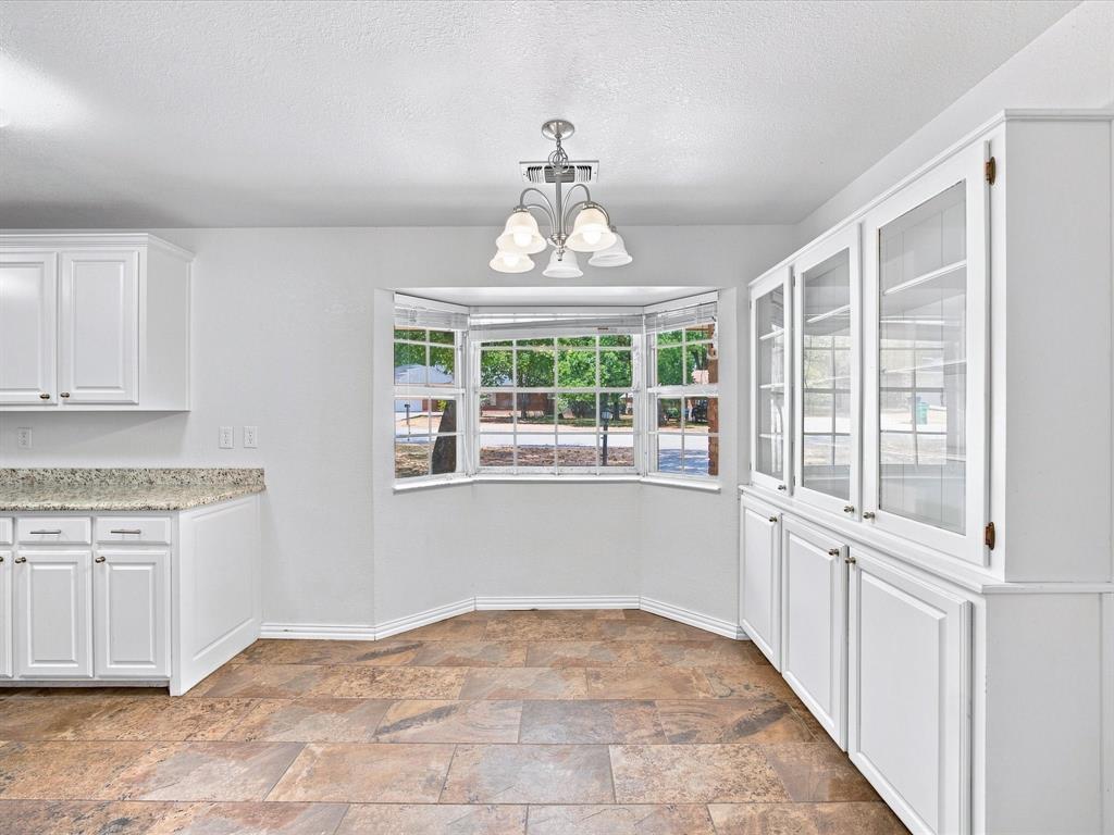 3107 South Lipsey Street Decatur, TX 76234 - Photo 7 of 40 Another view of the sunny kitchen dining