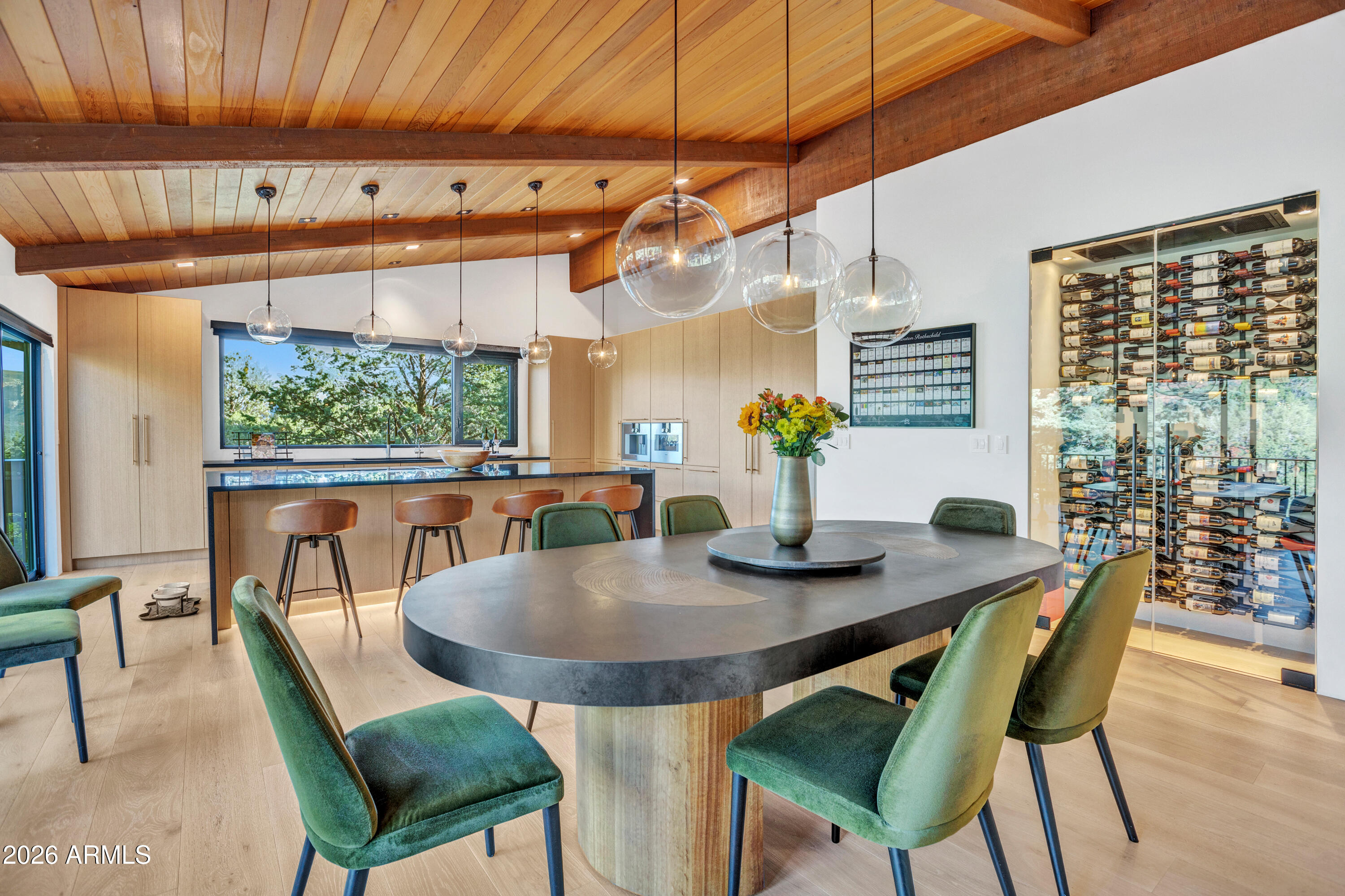 180 Rim Shadows Drive Sedona, AZ 86336 - Photo 5 of 72 a view of a dining room with furniture window and outside view