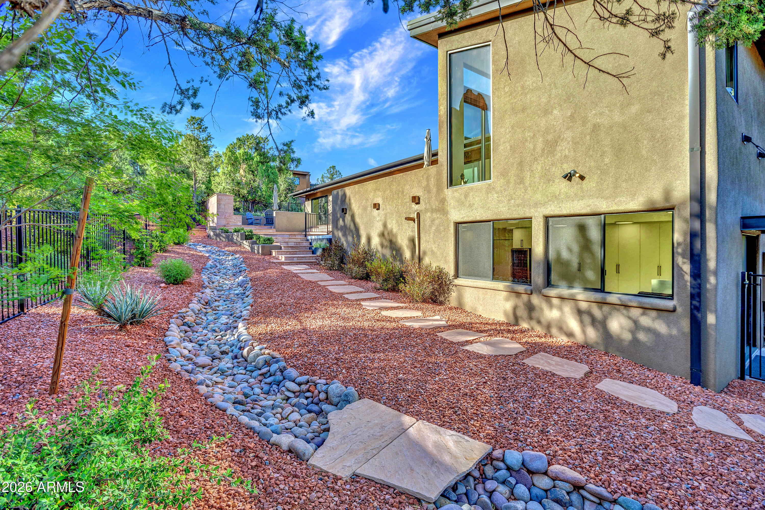 180 Rim Shadows Drive Sedona, AZ 86336 - Photo 51 of 72 a view of a entryway door of the house