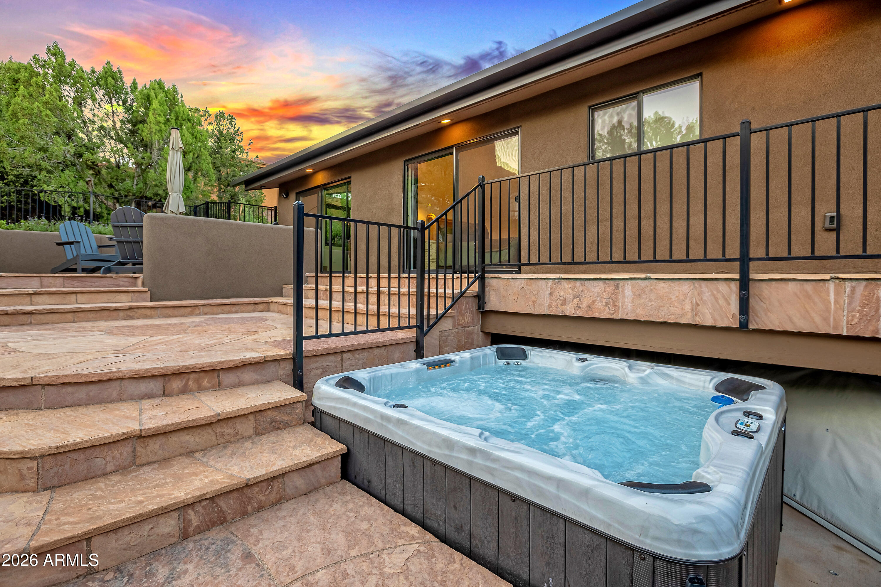 180 Rim Shadows Drive Sedona, AZ 86336 - Photo 59 of 72 a view of backyard with deck and wooden floor