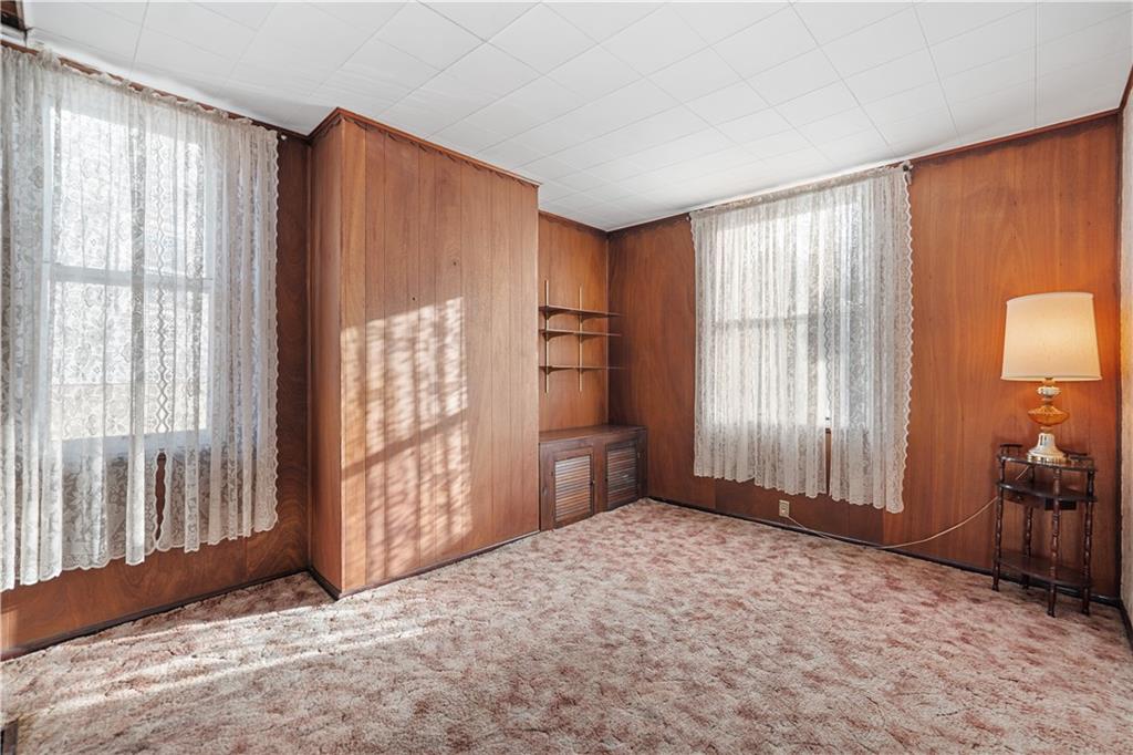 520 Center Street Rochester, PA 15074 - Photo 11 of 24 a view of an empty room with a window