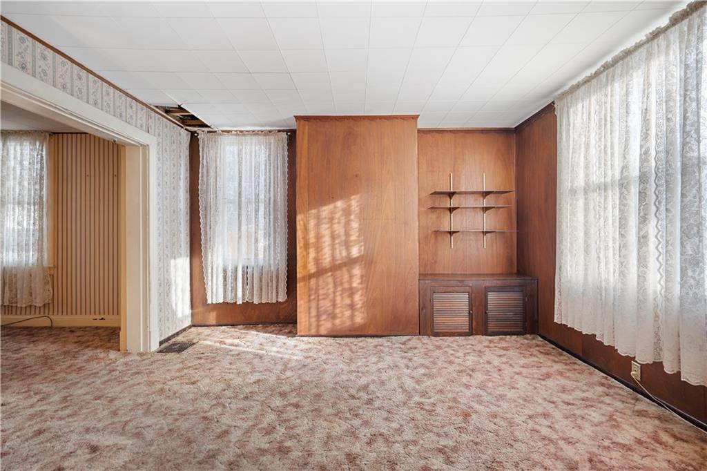 520 Center Street Rochester, PA 15074 - Photo 12 of 24 a view of an empty room with a window