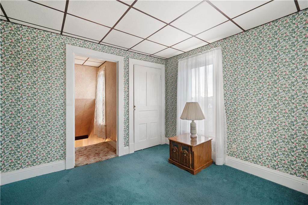 520 Center Street Rochester, PA 15074 - Photo 16 of 24 a room with a door