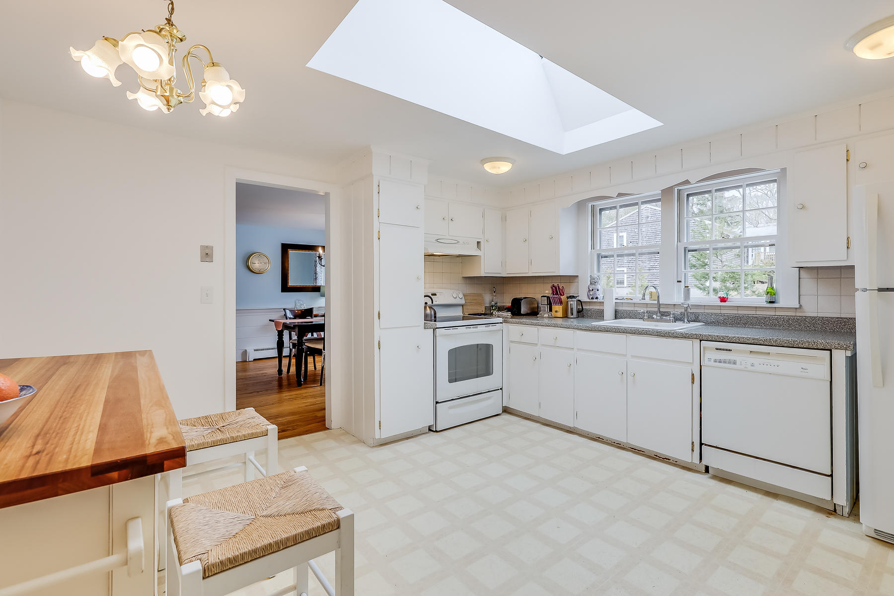 116 Long Road Harwich, MA 02645 - Photo 11 of 32 a kitchen with cabinets and window
