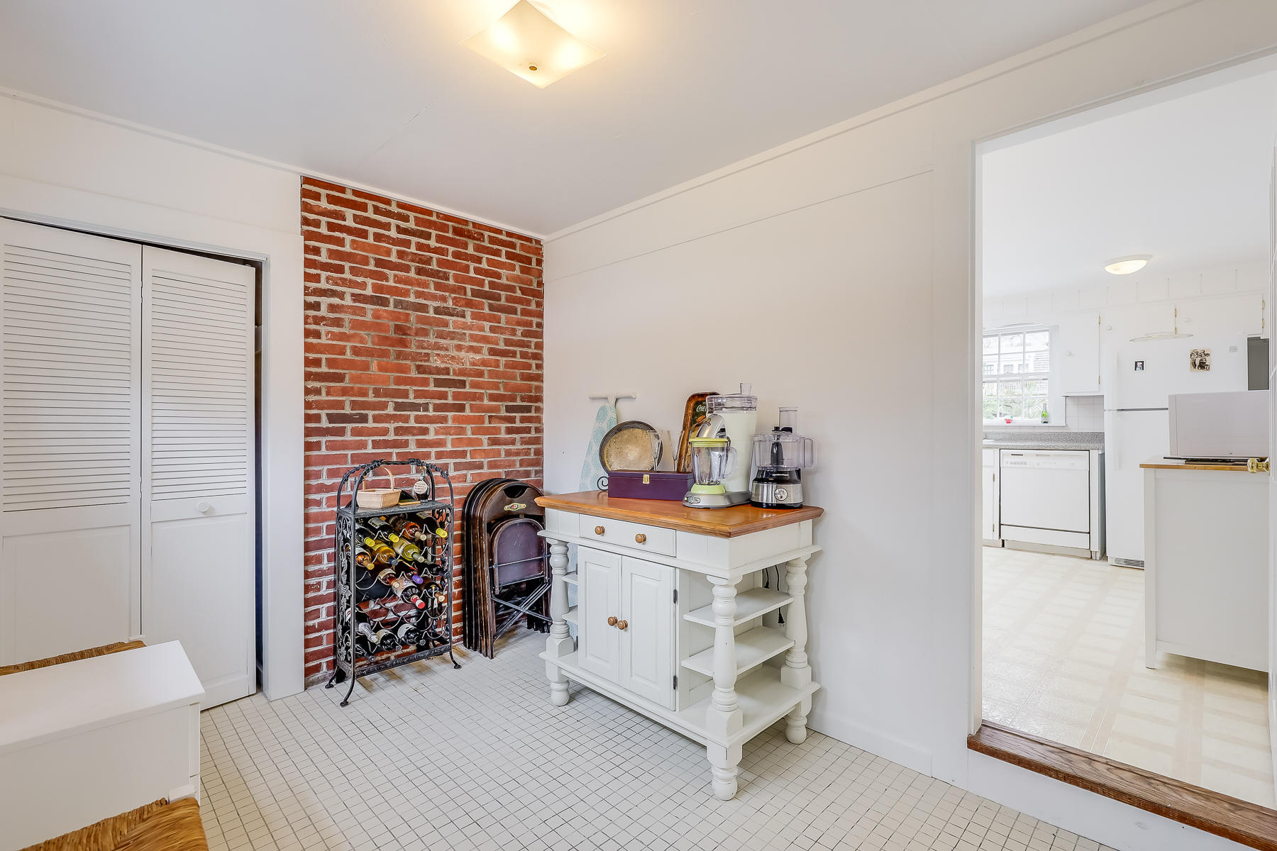 116 Long Road Harwich, MA 02645 - Photo 13 of 32 a bedroom with a bed and a table in it