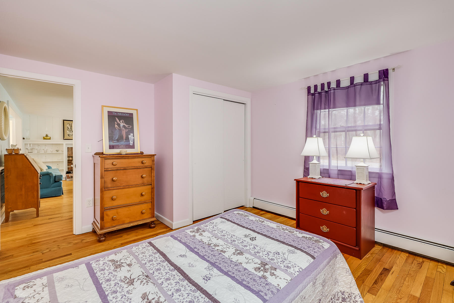116 Long Road Harwich, MA 02645 - Photo 16 of 32 a bedroom with a bed and a dresser in it