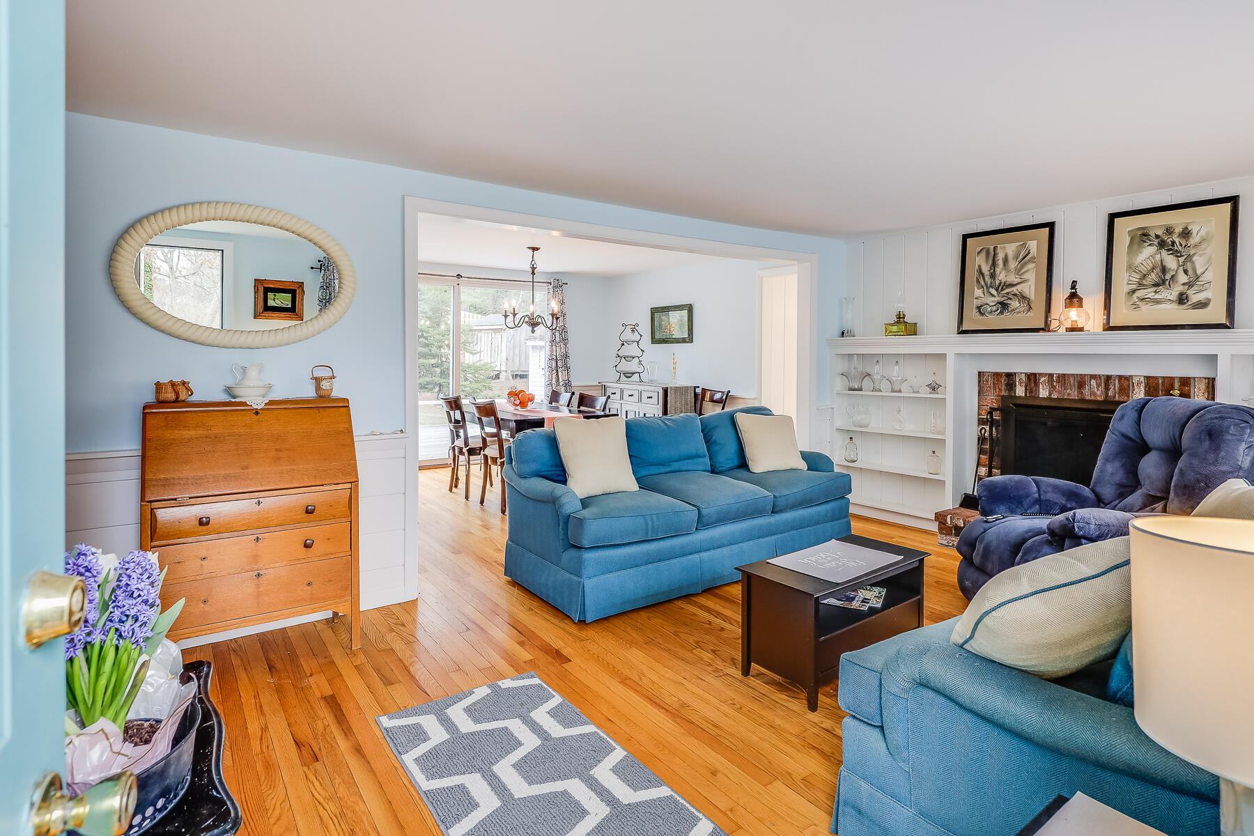 116 Long Road Harwich, MA 02645 - Photo 27 of 32 a living room with furniture and a fireplace