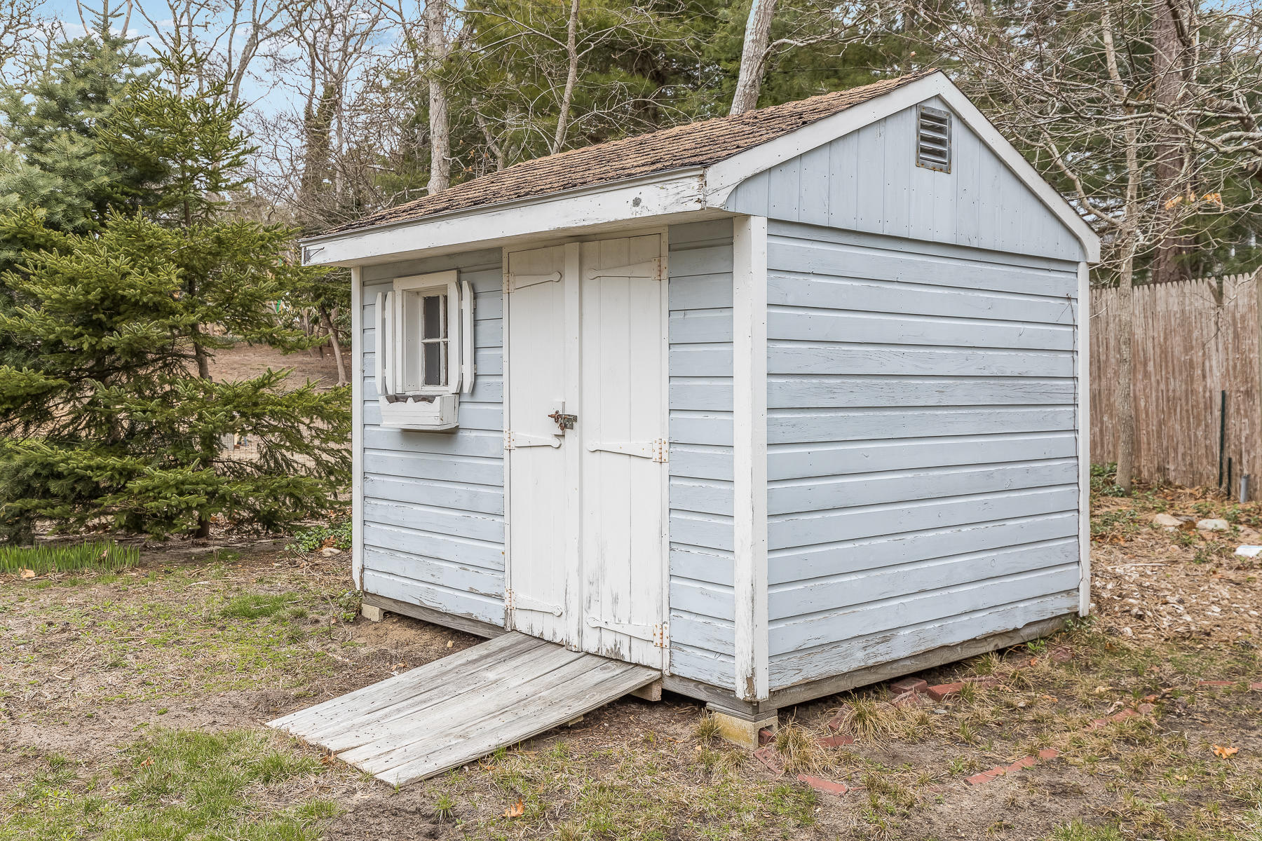 116 Long Road Harwich, MA 02645 - Photo 5 of 32 a view of a house with a yard