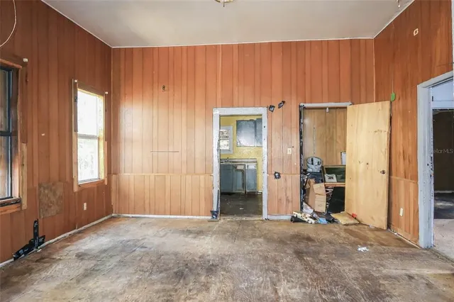 an empty room with windows