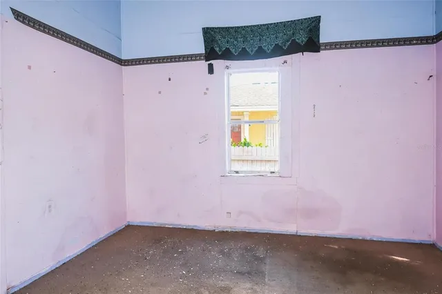 a view of a room with a window