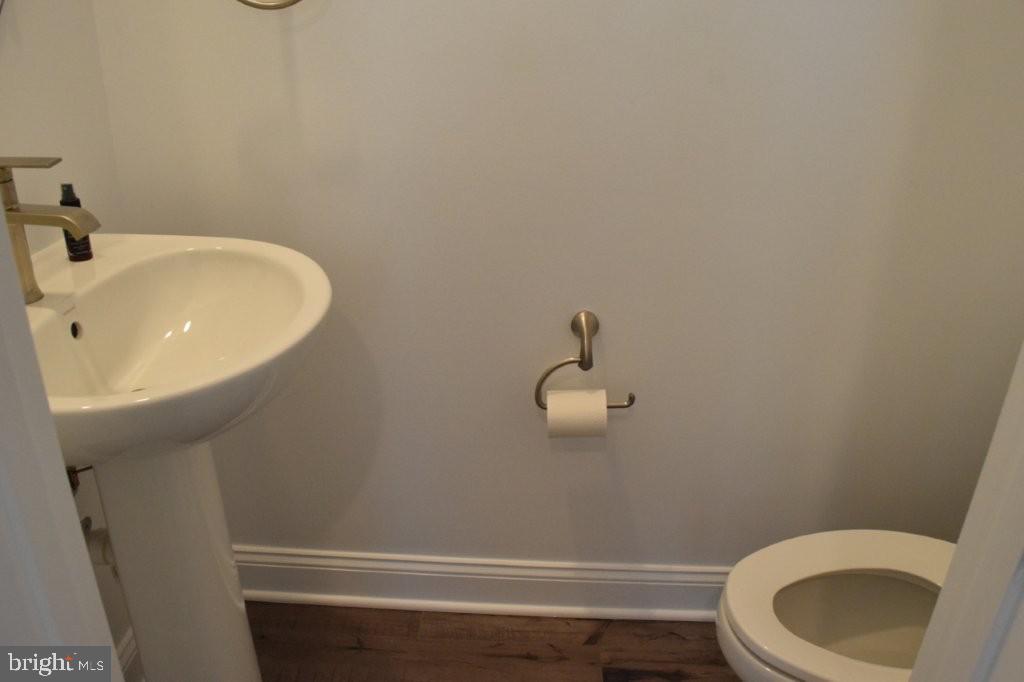 7505 Ledgers Way Hanover, MD 21076 - Photo 23 of 50 a bathroom with a sink and a toilet