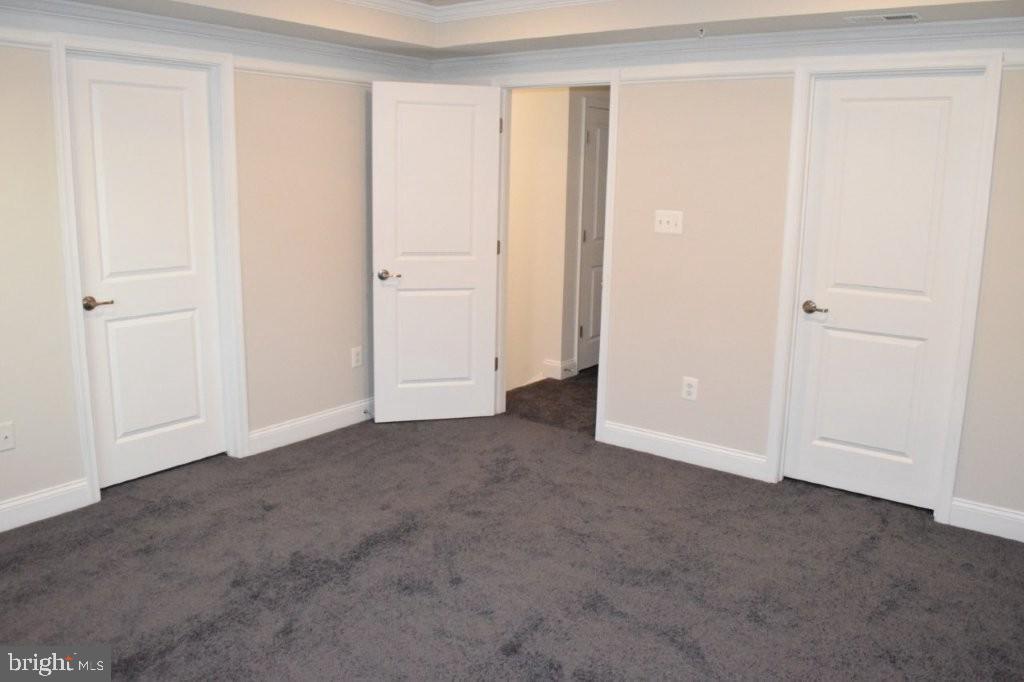 7505 Ledgers Way Hanover, MD 21076 - Photo 26 of 50 a view of an empty room and closet area