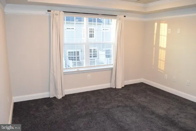 a bathroom with a granite countertop sink and vanity
