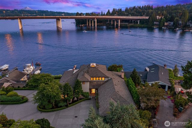 an aerial view of a house with outdoor space