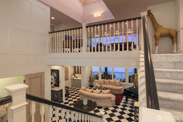 a bathroom with a toilet a sink and a mirror