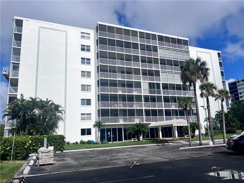 5 Bluebill Avenue, Unit 3031 Naples, FL 34108 - Photo 2 of 24 a view of a building with a street
