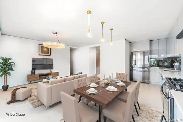 a dining room with furniture and a wooden floor