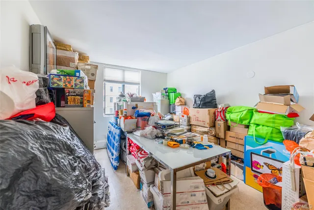 a bed room with a bed and a table