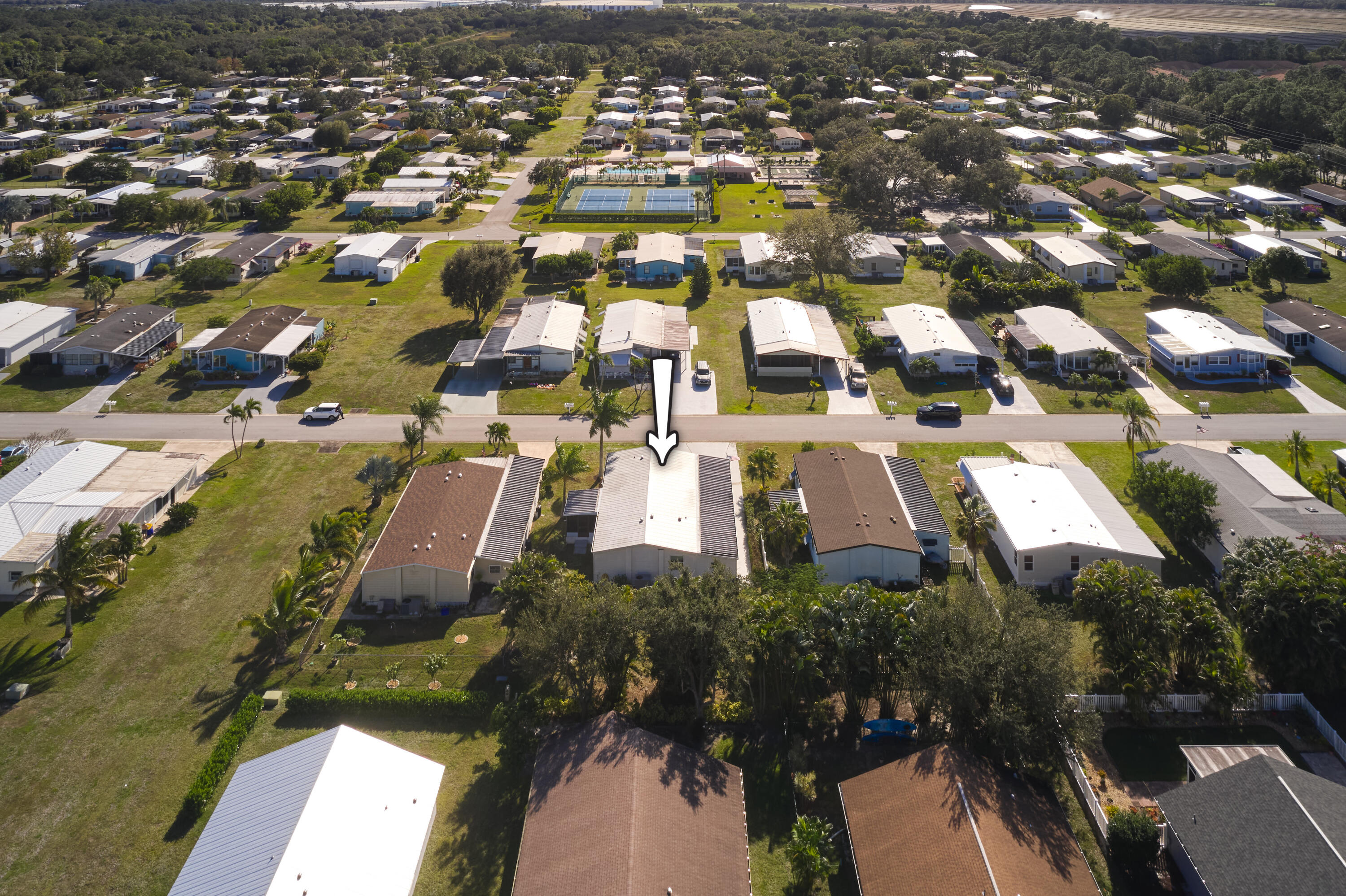 2779 Southwest Olds Place Stuart, FL 34997 - Photo 23 of 41 an aerial view of residential houses with outdoor space