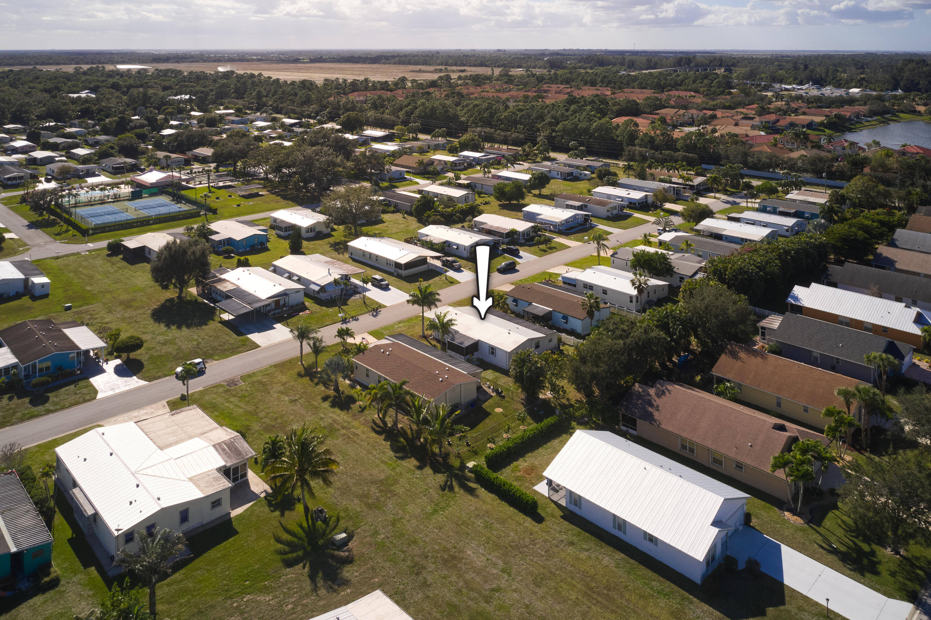 2779 Southwest Olds Place Stuart, FL 34997 - Photo 24 of 41 an aerial view of residential houses with city view