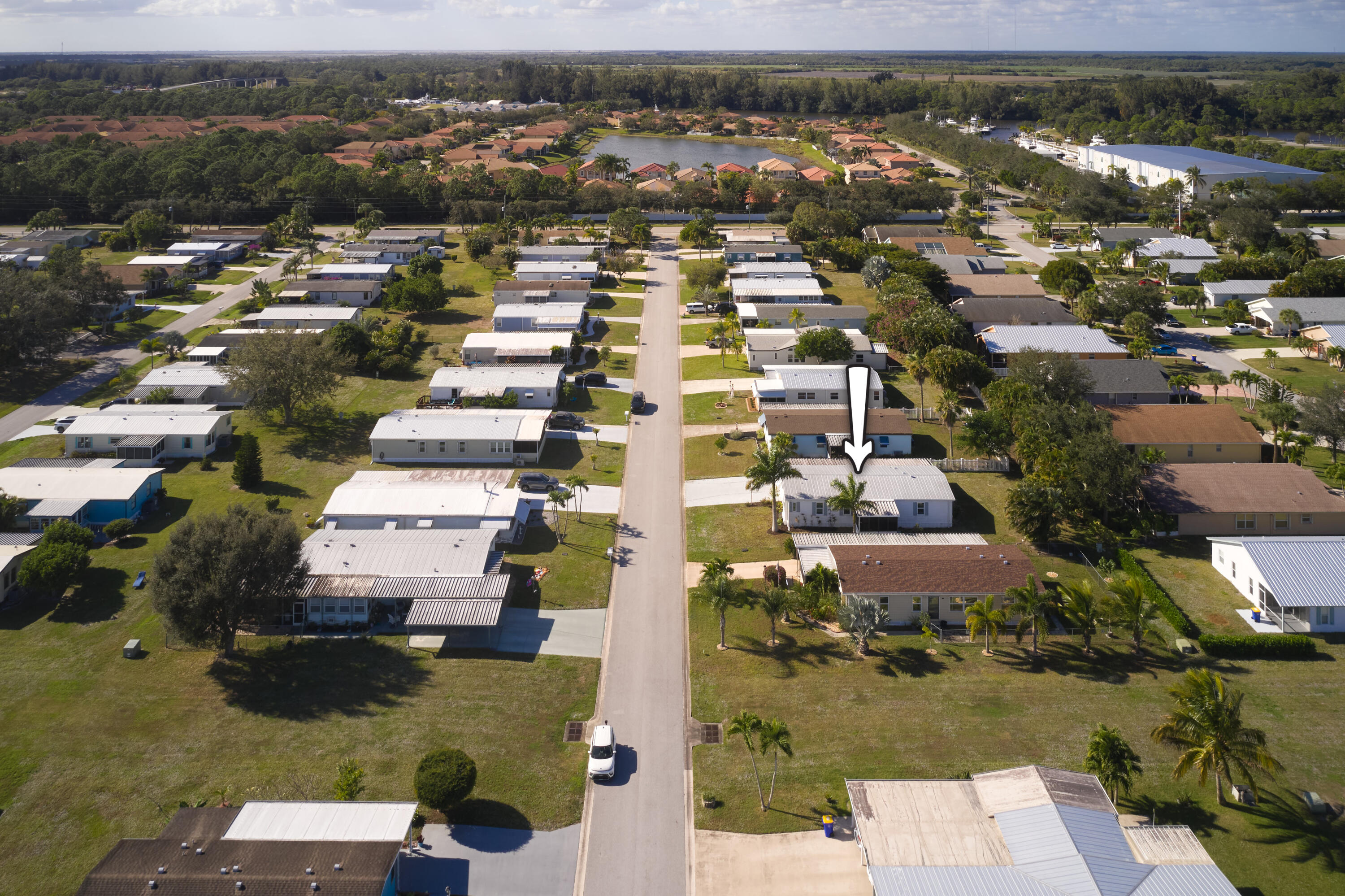 2779 Southwest Olds Place Stuart, FL 34997 - Photo 25 of 41 an aerial view of residential houses with outdoor space