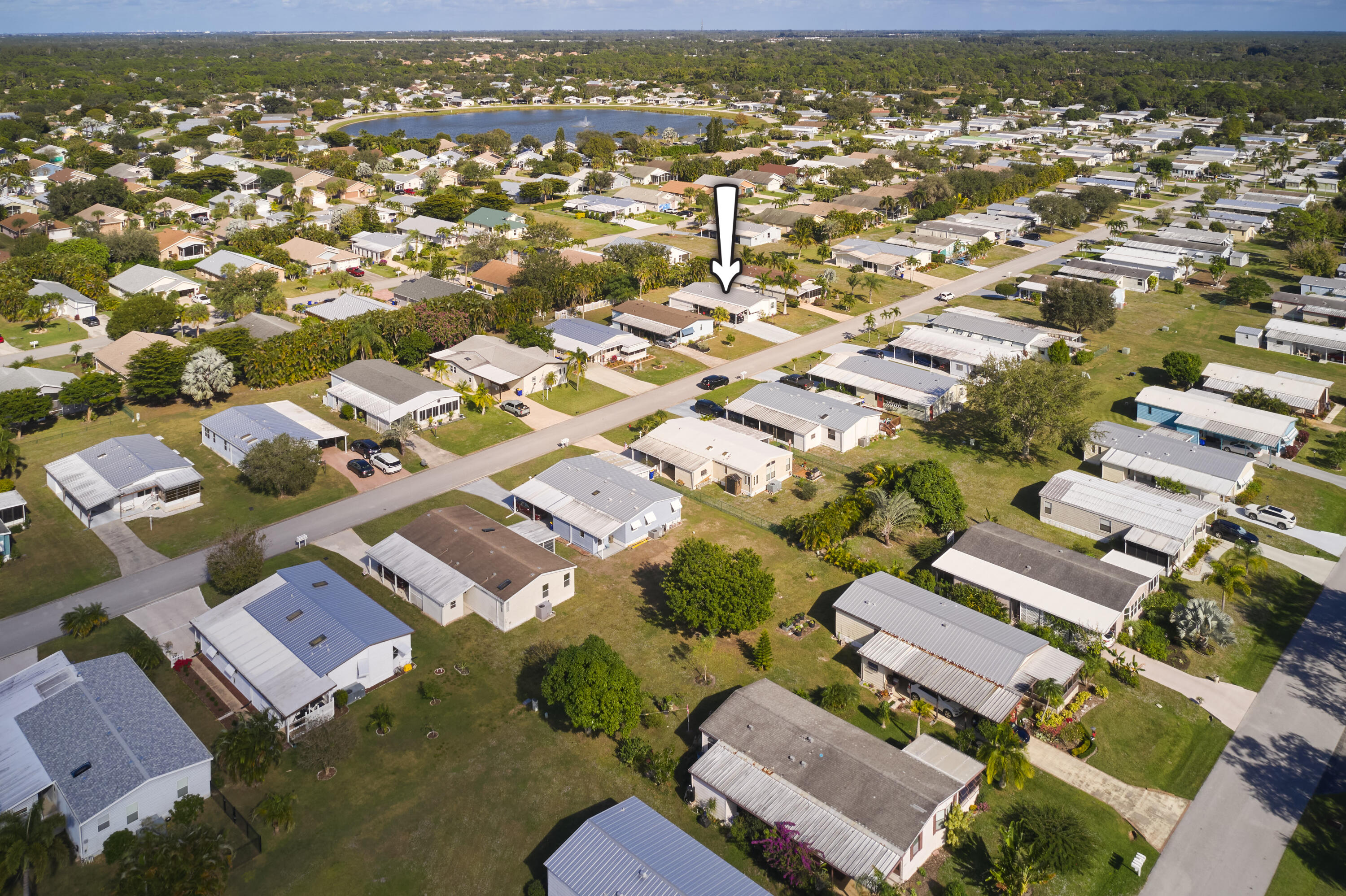 2779 Southwest Olds Place Stuart, FL 34997 - Photo 26 of 41 an aerial view of residential houses with outdoor space