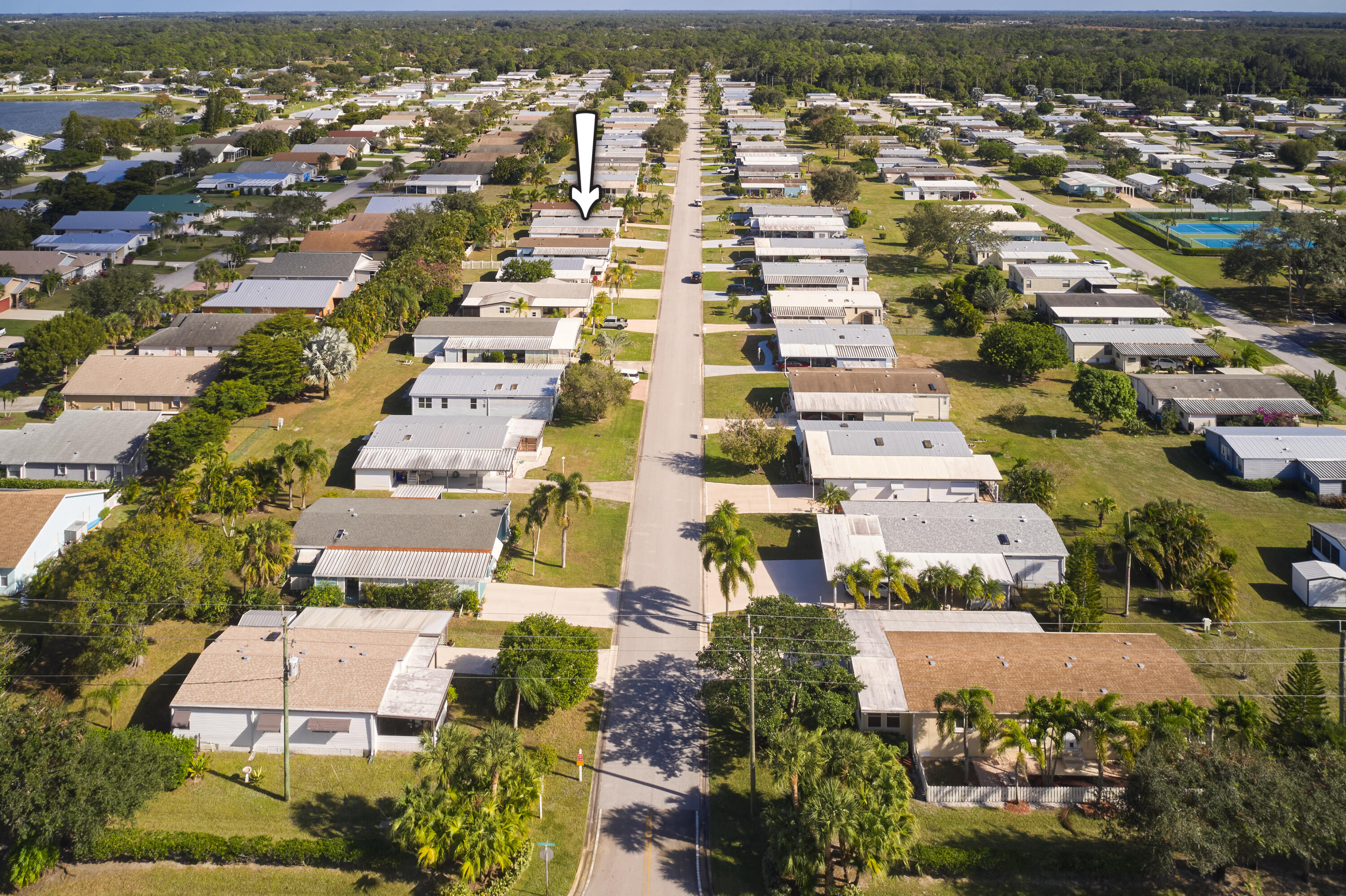 2779 Southwest Olds Place Stuart, FL 34997 - Photo 27 of 41 an aerial view of residential houses with outdoor space