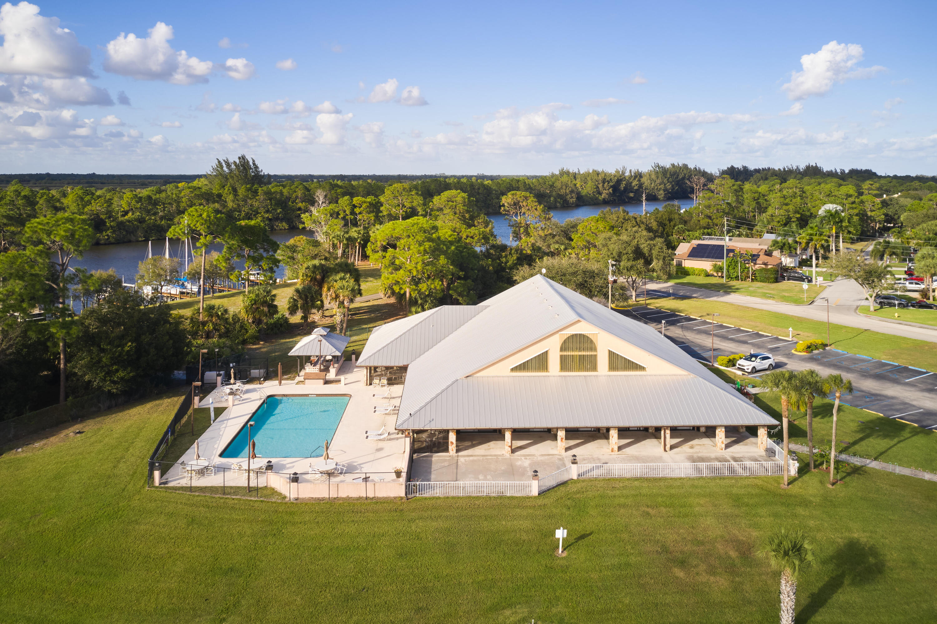 2779 Southwest Olds Place Stuart, FL 34997 - Photo 28 of 41 a view of a house with a yard and lake view